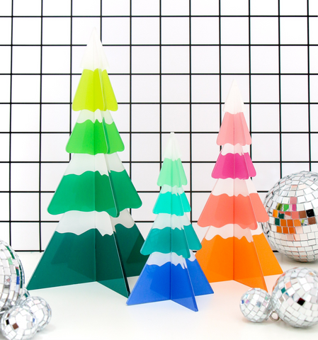Rainbow snow capped Christmas trees