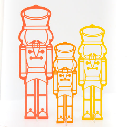 Coral and yellow acrylic nutcrackers
