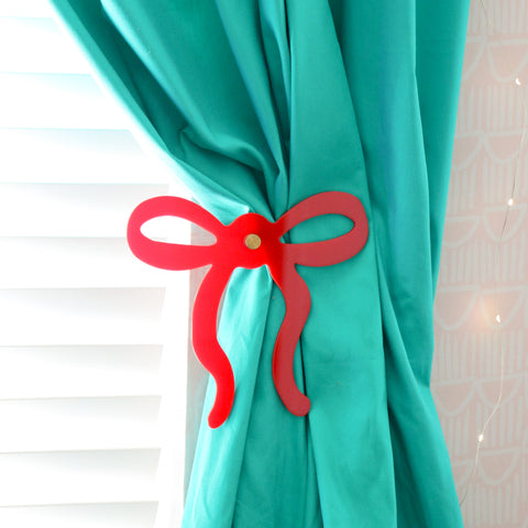 Red bow acrylic curtain tie back