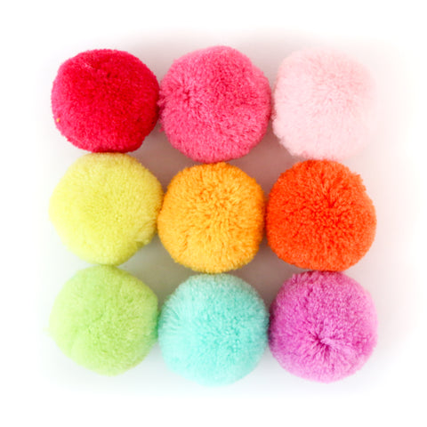 Rainbow set of pom poms